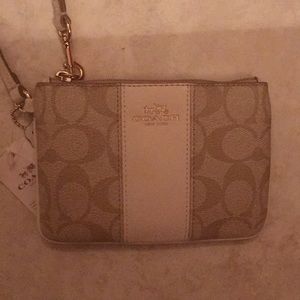 Light khaki/chalk small Coach wristlet